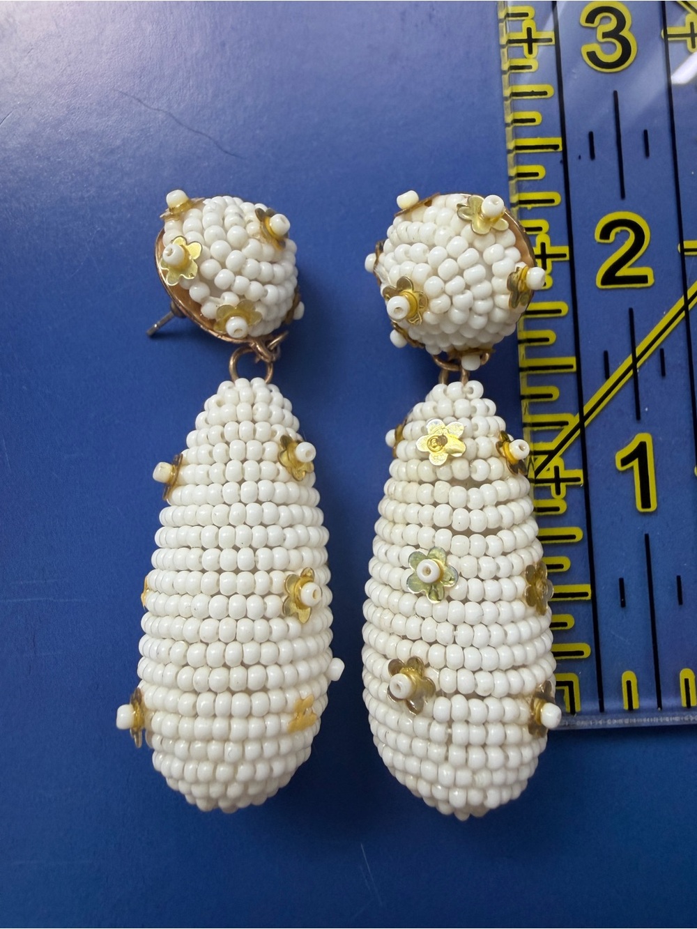 Nanette Lepore Cream Beaded Drop Earrings with Gold Flower Accents